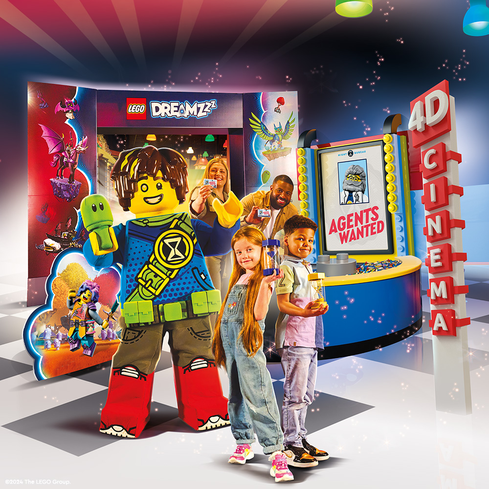 Family of 4 viewing LEGO Dreamzzz 4D cinema movie at LEGO Discovery Center Boston